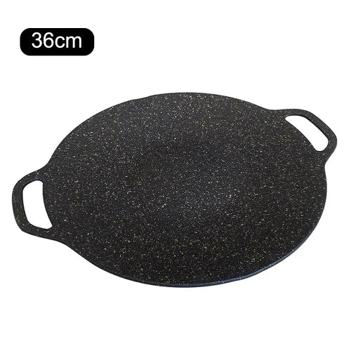 A black BBQ grill/griddle with white speckles that is 36cm.