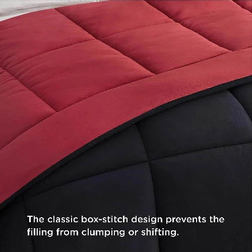 A red and black reversable duvet insert for your comfort with the top folded down and text that says, "The classic box-stitch design prevents the filling from clumping or shifting."