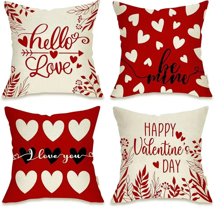 Picture of 4 options of Valentine's Day Pillows. First one says Hello Love, Second Be Mine, Third I Love You, and Fourth Happy Valentine's Day.  Pillow Covers are White with Red Letters or Red with Black and White Letters and Design