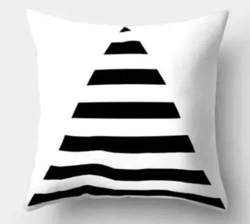 A white square throw pillow with bold black and white lines each longer than the one above creating a triangle design.