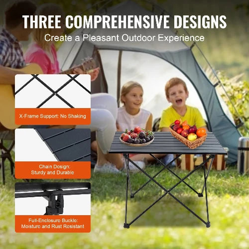 This picture features the table in front of a family camping. The header states, "Three Comprehensive Designs" and the sub-header states "Create a Pleasant Outdoor Experience". On the left-hand side there are three pictures. The first picture shows the "X-Frame Support: No Shaking"; the second picture shows the "Chain Design: Sturdy and Durable"; and the third picture shows "Full-Enclosure Buckle: Moisture and Rust Resistant.  